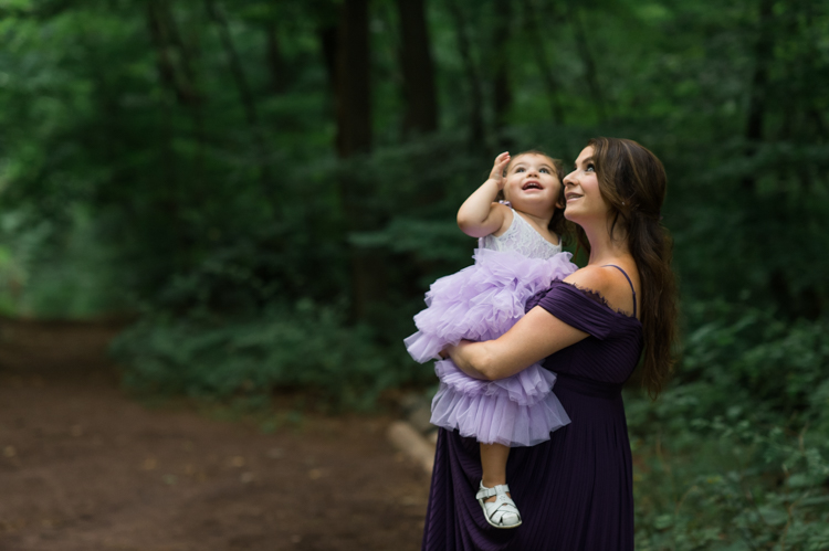 I was thrilled when Michelle from Pink Comb Studio reached out for her maternity photos. Following COVID-19 rule, keeping social distance I photographed Michelle and her two beautiful girls at Watchung Mountain NJ. With overcast weather three trees and grass showed such a rich deep green colors. I love bold rich colors in my photos as much as I love sunset golden hour. Michelle was just glowing and looked so beautiful. Was so happy to have such a beautiful mama in front of my camera before Michelle becomes mama of three girls. I can not wait to see her new baby girl and see her family grow. Michelle Surgent’s maternity session captured by Karis from heykaris.